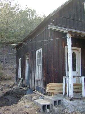 The old single-glazed, double-hung windows are rotting and should be replaced with matching low-E windows.